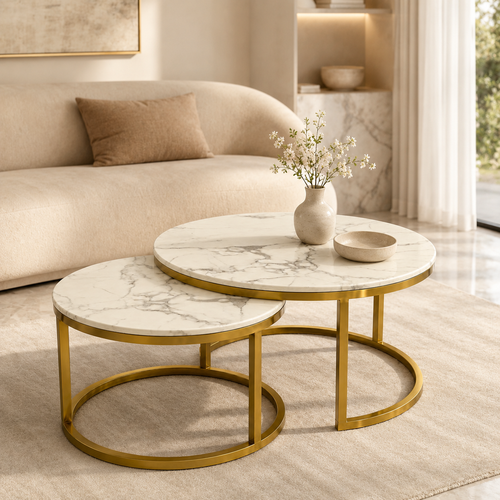 Aurelia 2-piece marble-top nesting coffee table set with gold chrome legs in a modern living room