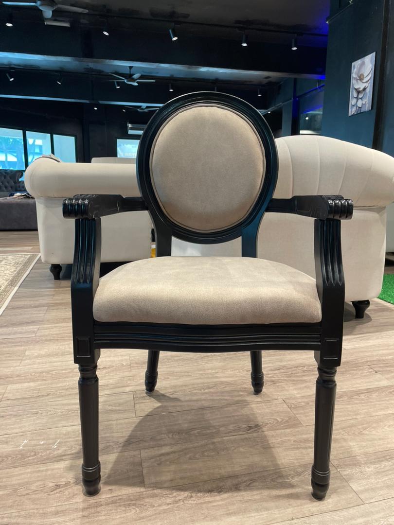 Roma dining chair shown in dining set styling