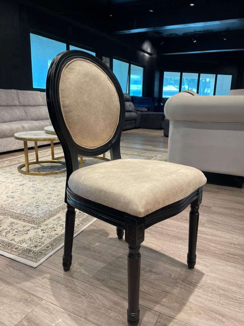 Roma dining chair shown in dining set styling