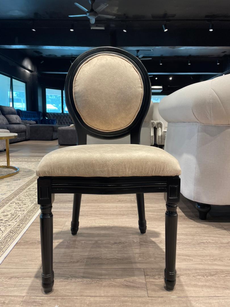 Roma dining chair shown in dining set styling