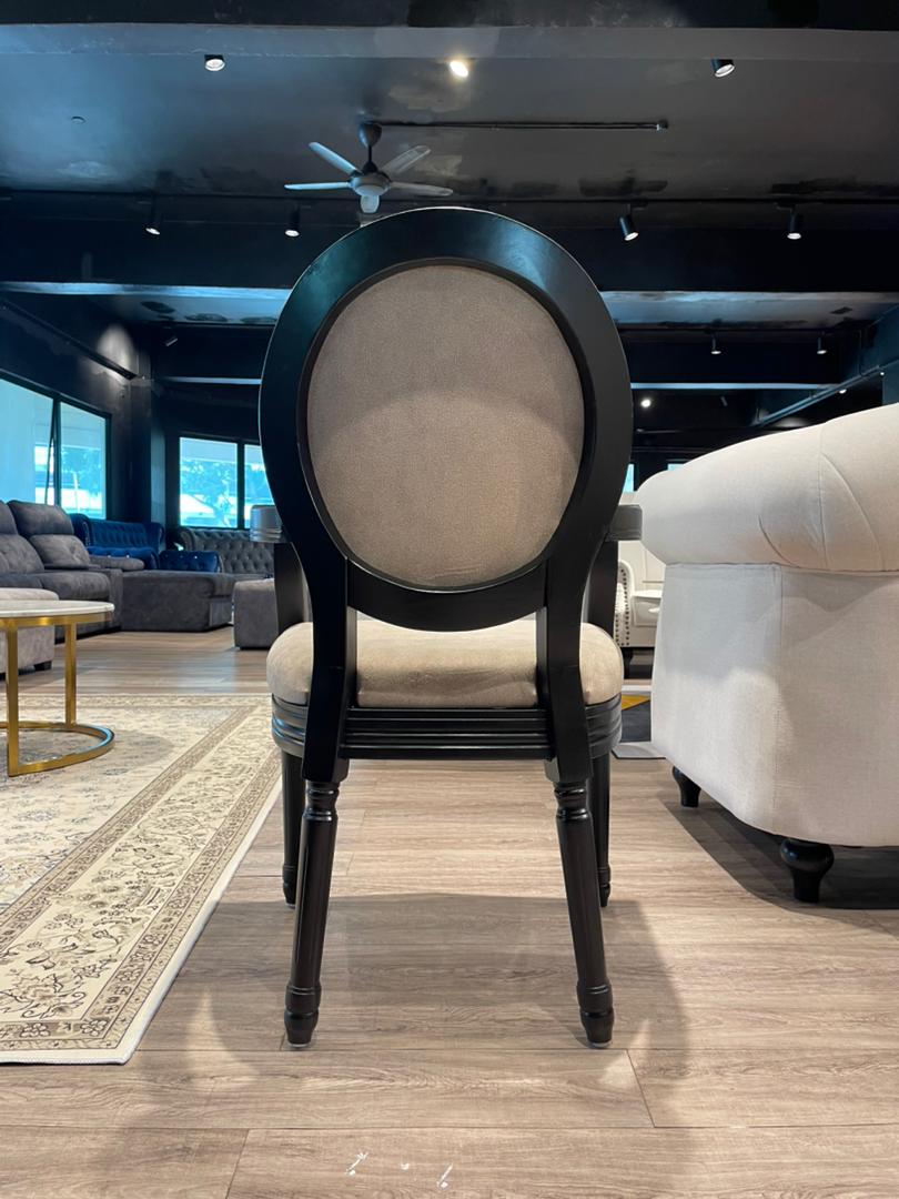 Roma dining chair shown in dining set styling