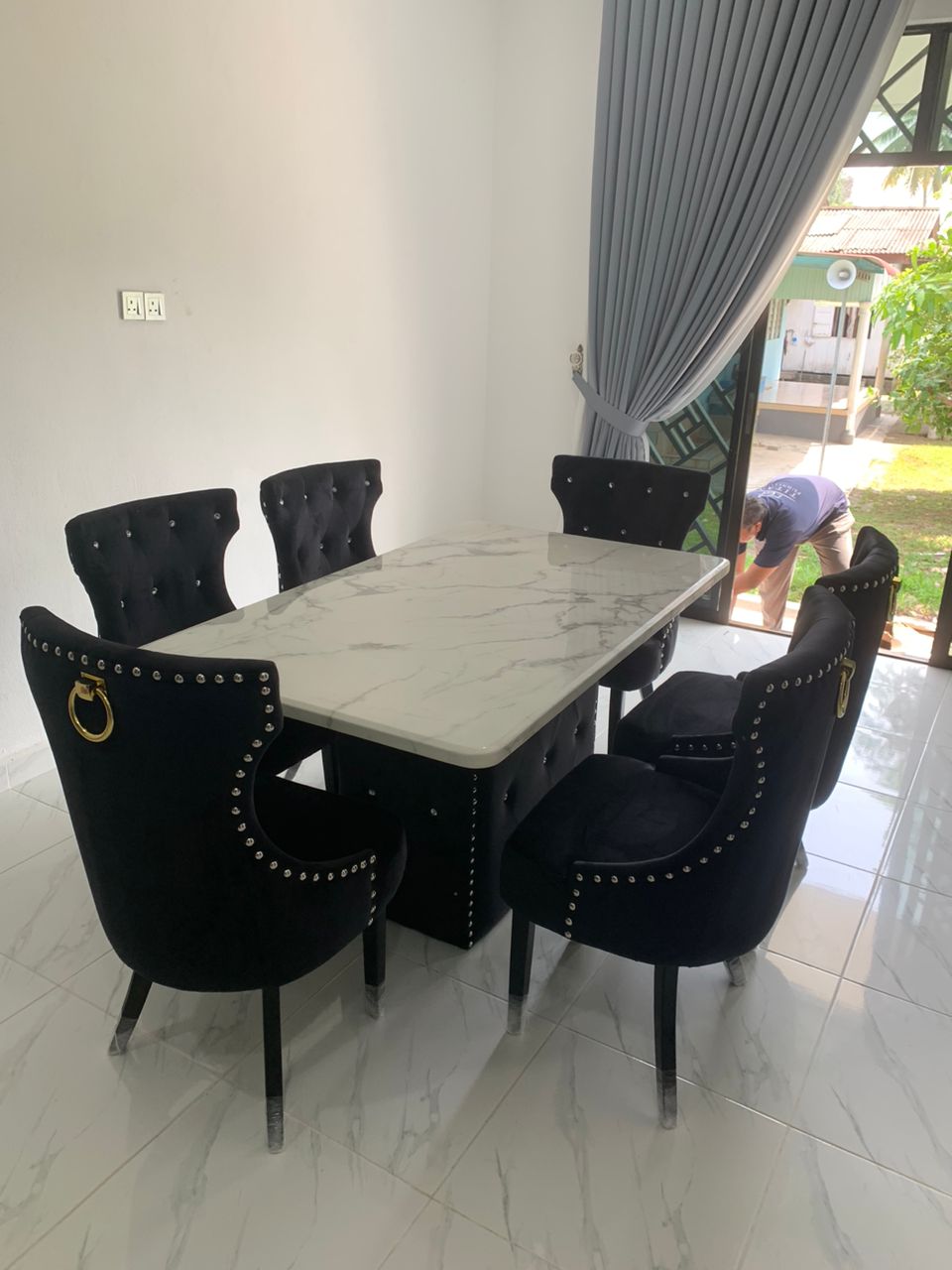 Butterfly marble dining set in customer dining room