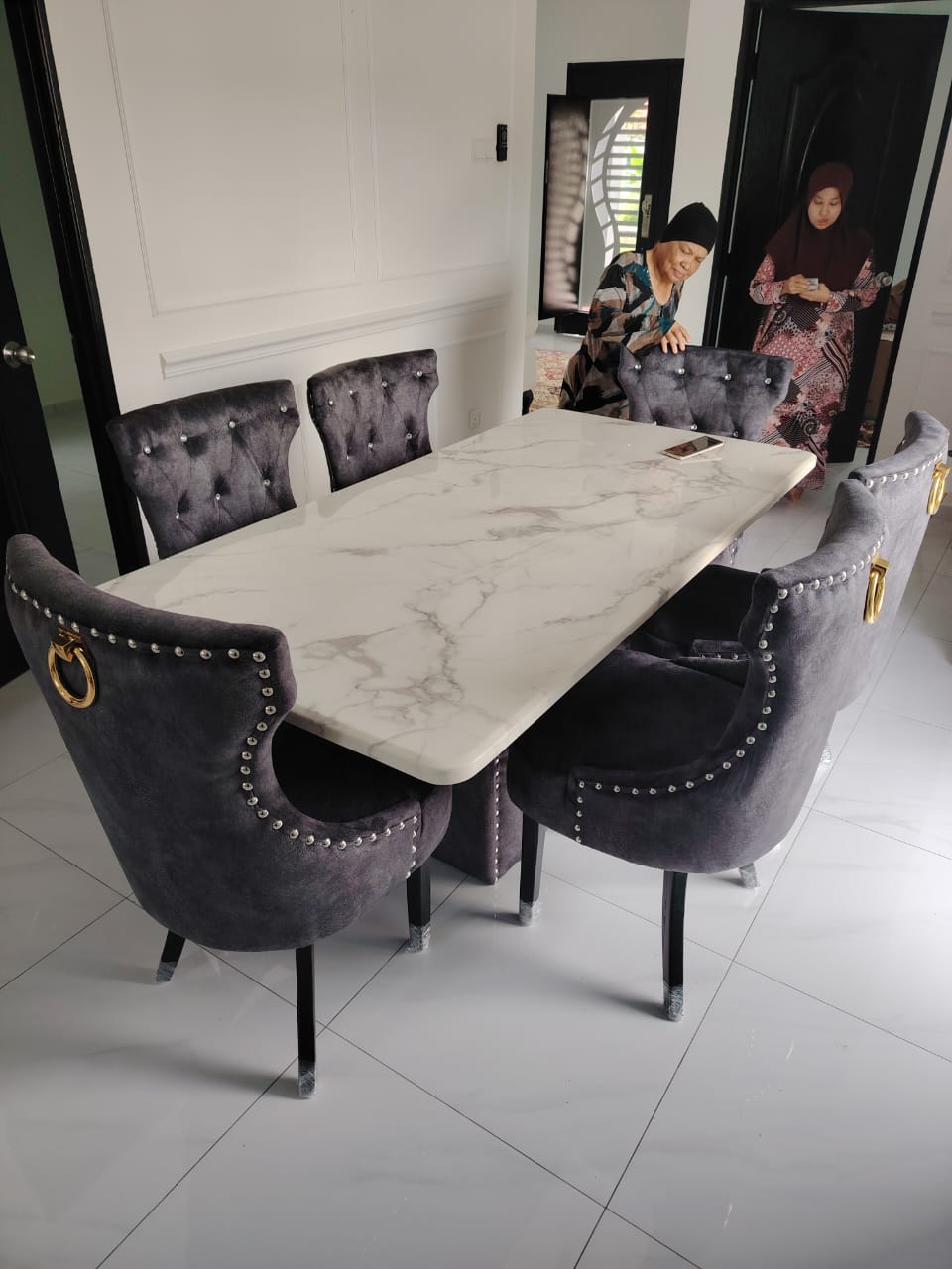 Butterfly marble dining set customer photo with upholstered chairs