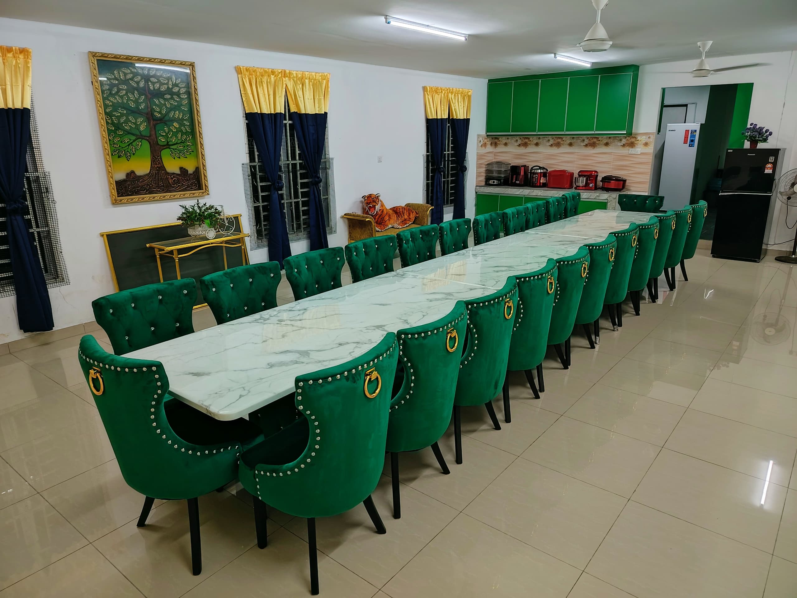 Long green velvet Butterfly dining set with marble table for large gathering