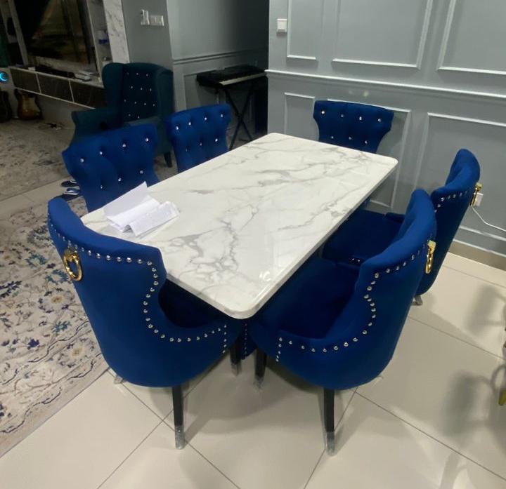 Butterfly marble dining set room view with velvet chairs